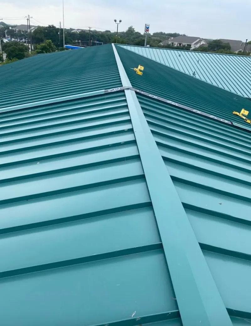 Green commercial metal roof ridge and valley for Metal Roof Repair in Moores Mill